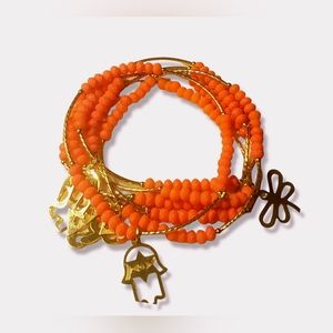 Orange bohemian gold charms hamsa, elephant, Clover butterfly stretch bracelets